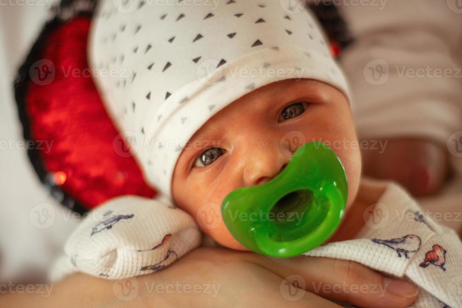 Portrait of a cute newborn girl photo