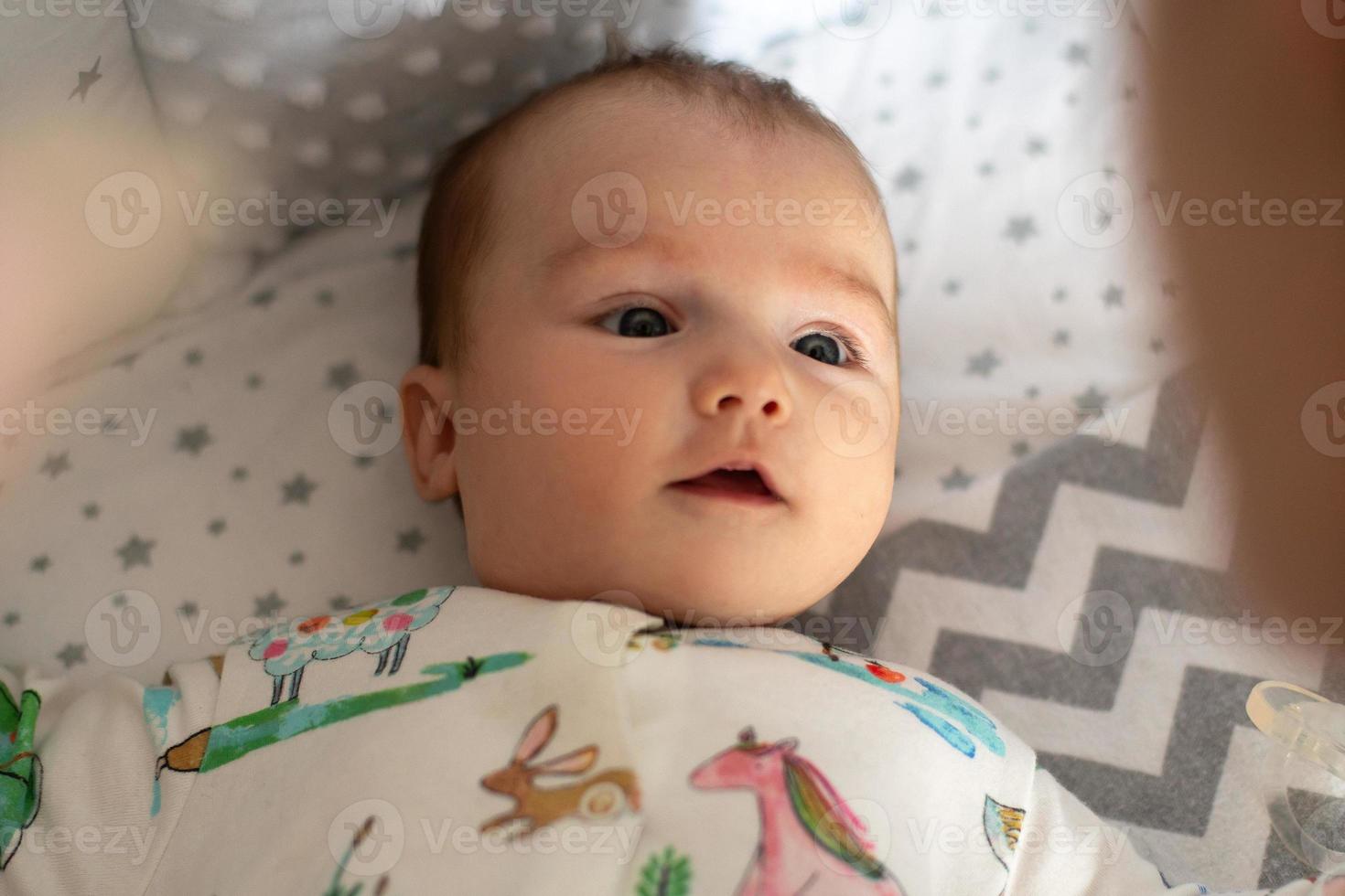 closeup portrait of a beautiful little baby girl photo