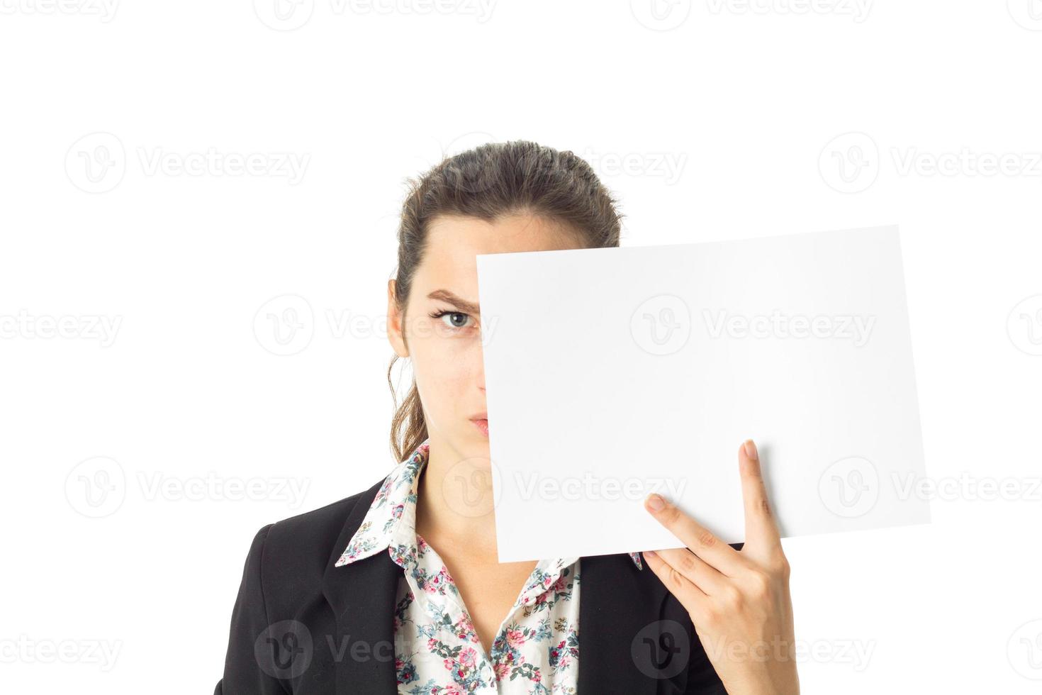 woman in uniform with white placard in hands photo