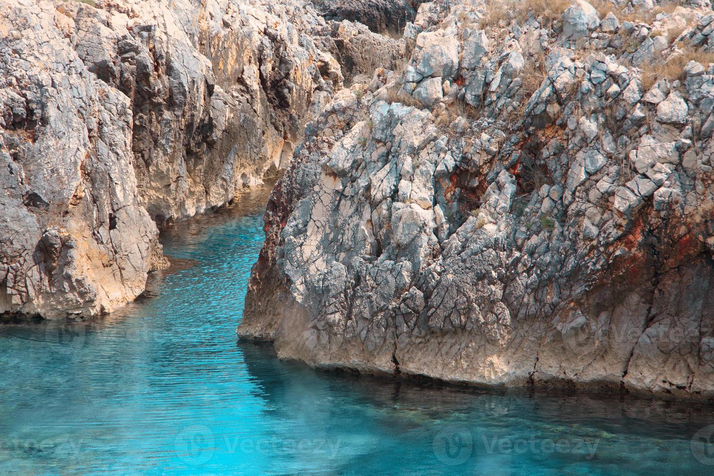 blue sea and rocks photo