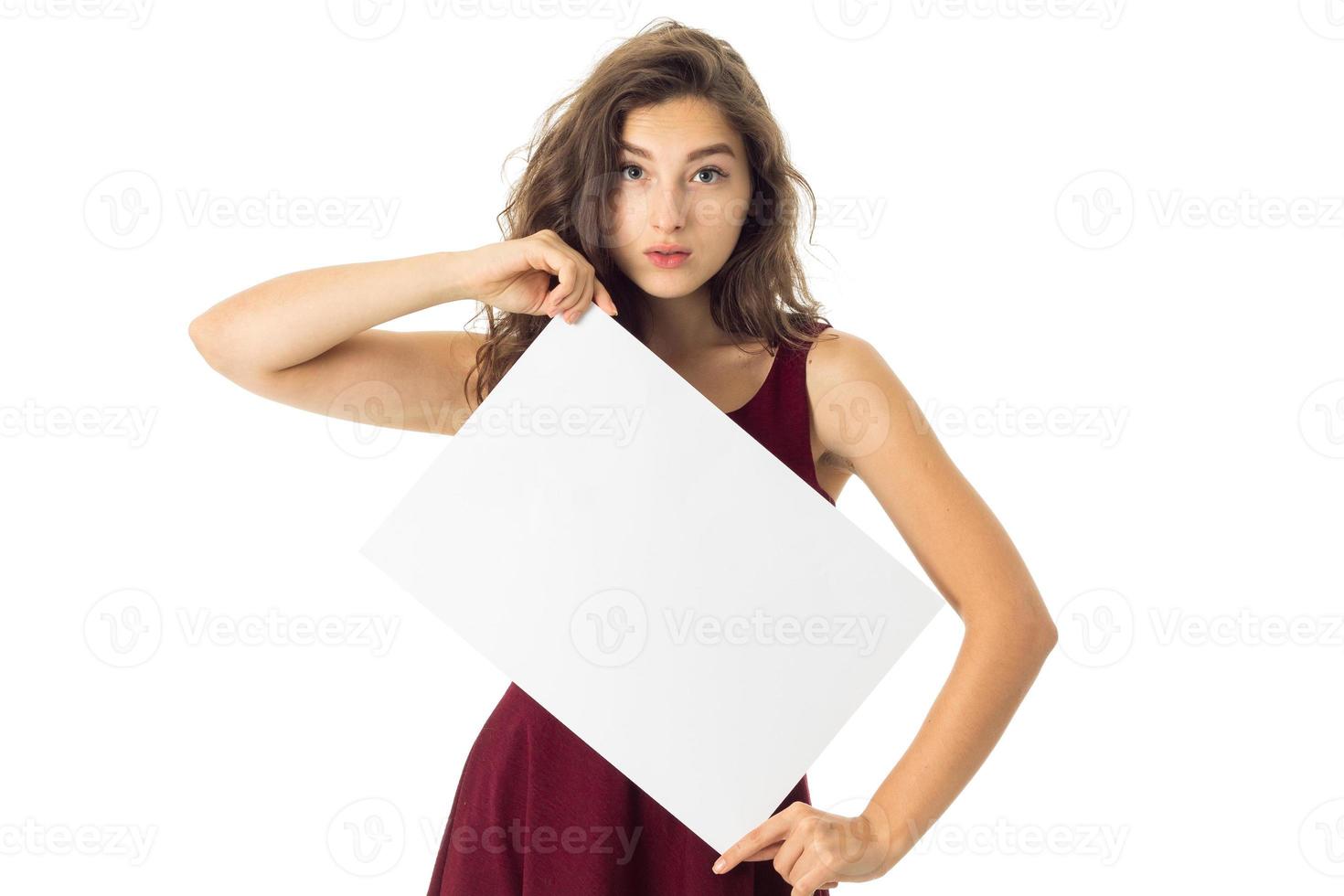 girl in red dress with white placard photo