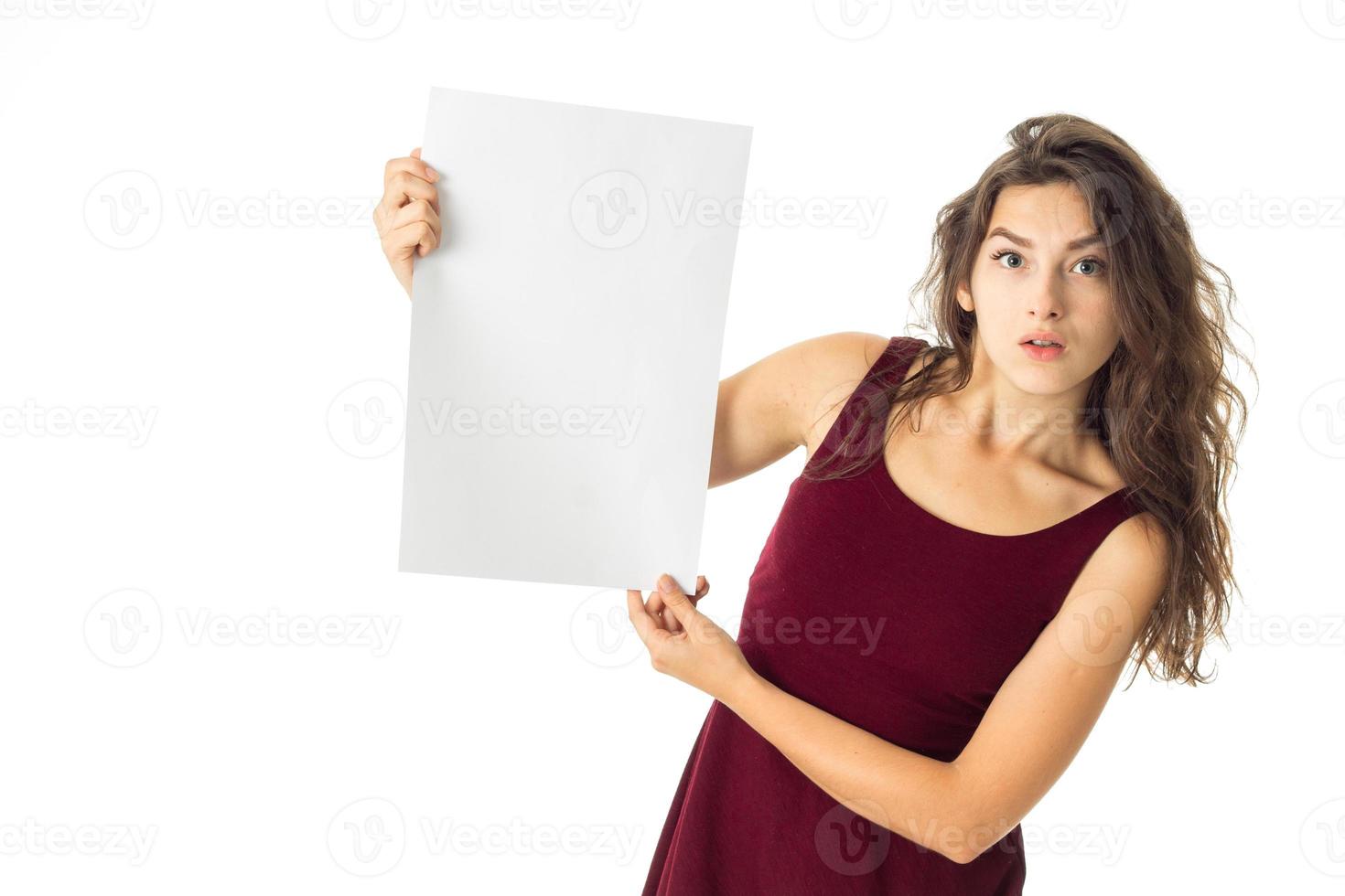 girl in red dress with white placard photo