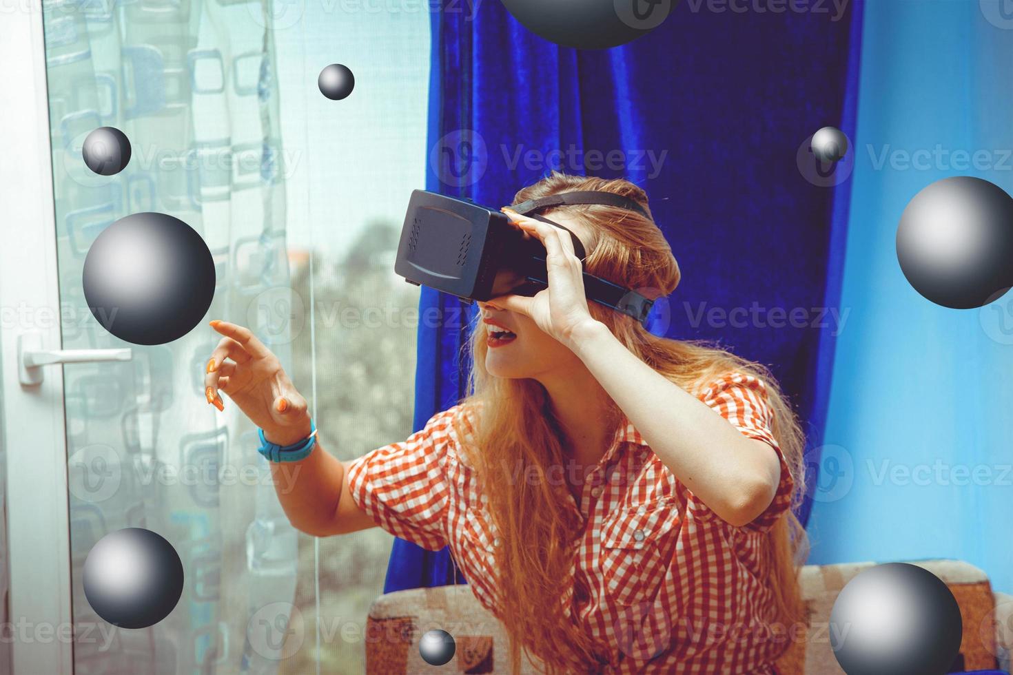 woman in virtual reality helmet photo