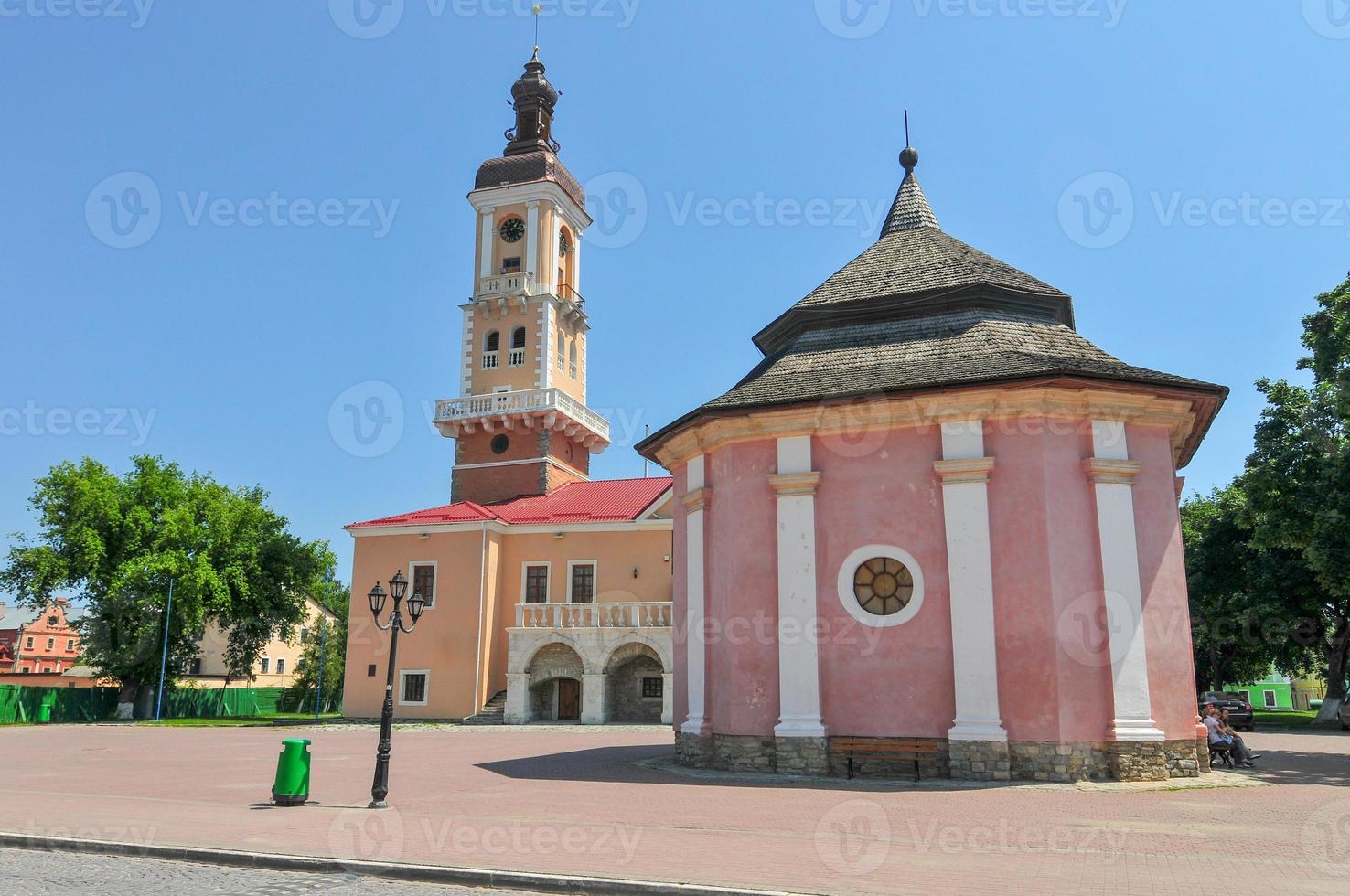 Town Hall of Kamenets Podolsky in Ukraine. Kamenetz-Podolsk City Hall was built on the central square of the Old Town in the 14th century and is considered one of the oldest in Ukraine. photo