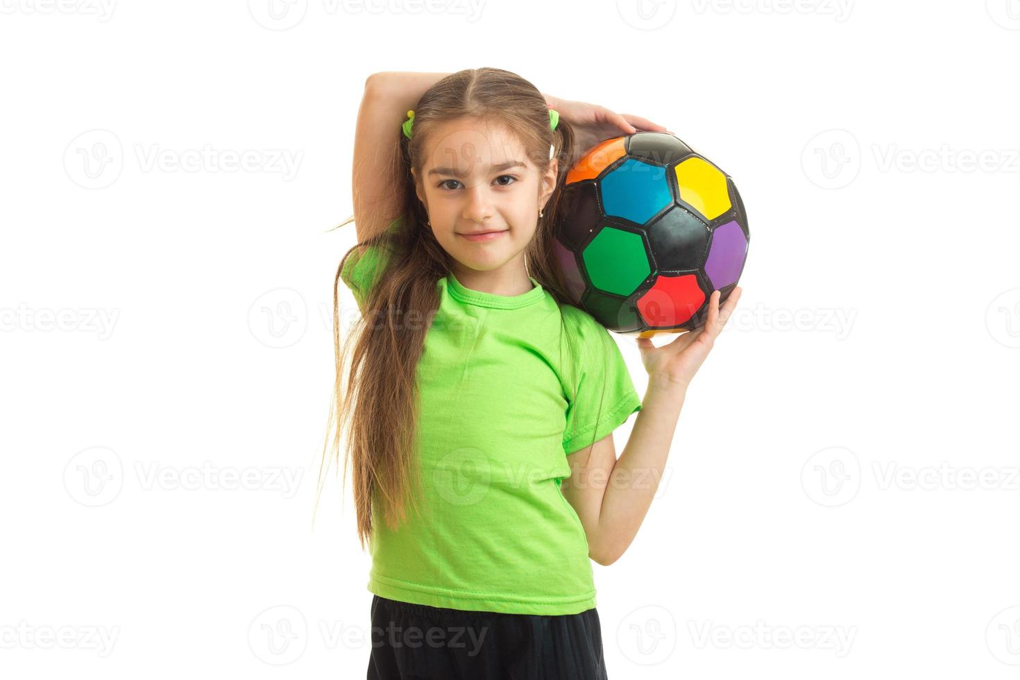 cutie little girl with multicolor soccer ball in hands photo