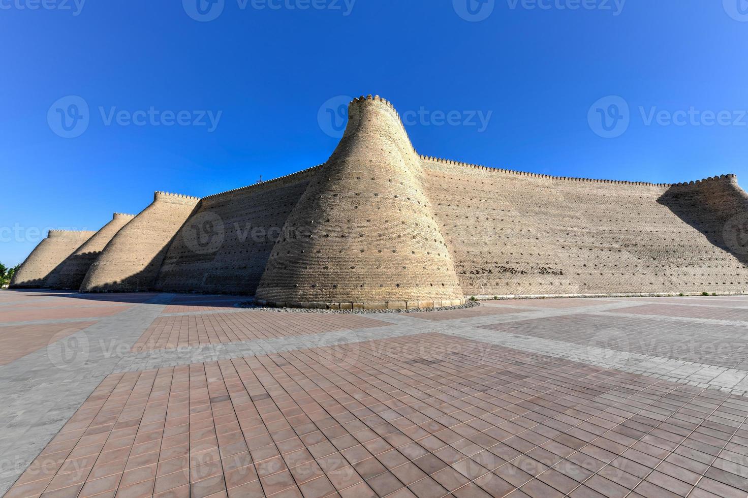Wall of the Bukhara Fortress, Uzbekistan. The Ark of Bukhara is a massive fortress located in the city of Bukhara, Uzbekistan that was initially built and occupied around the 5th century AD. photo