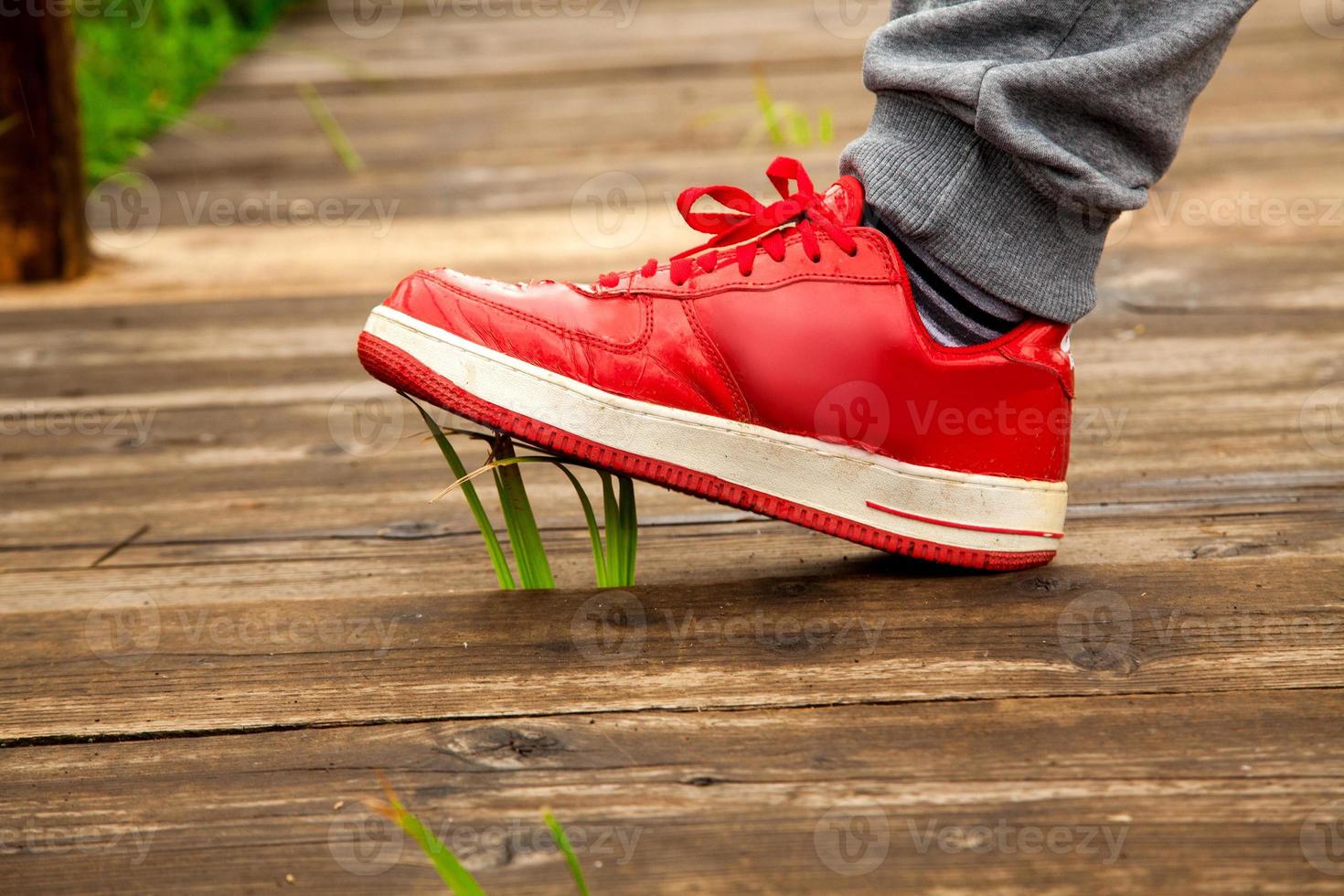 guy treads grass photo