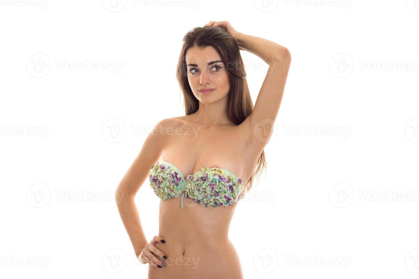 young beautiful girl with sexual breasts in bathing suit holding a hand  near the hair and looking at camera 16100445 Stock Photo at Vecteezy