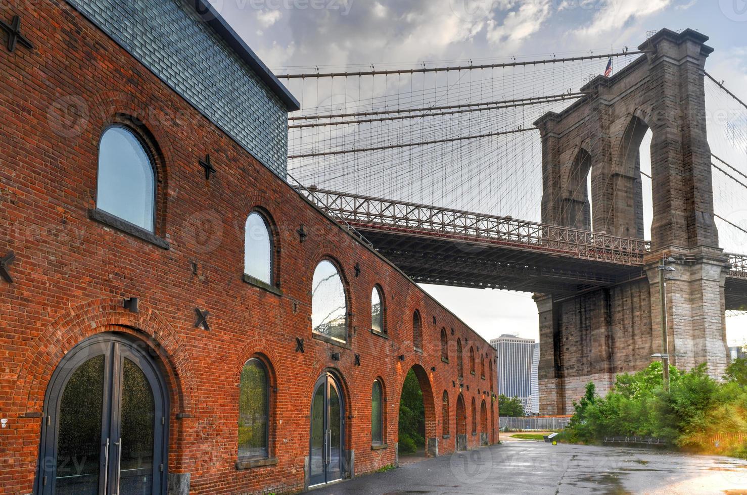 Brooklyn Bridge by Saint Anne's Warehouse in Brooklyn, New York after a rain shower. photo