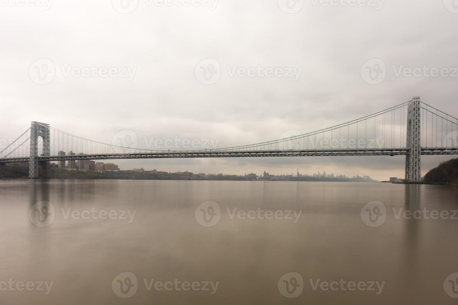 George Washington Bridge crossing the Hudson River on a overcast cloudy day from Fort Lee, New Jersey. photo