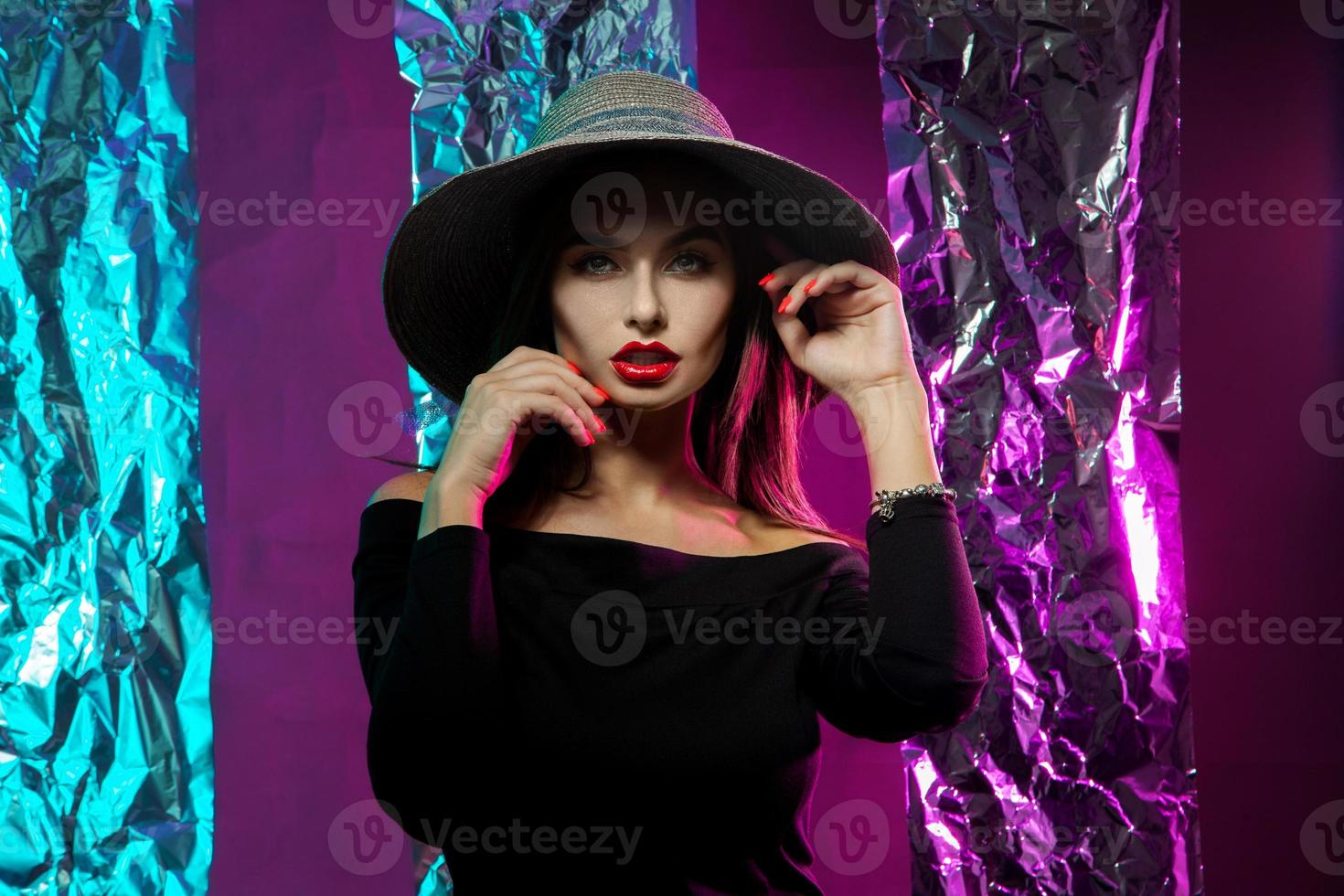 Hot beautiful woman in hat with wide brim photo