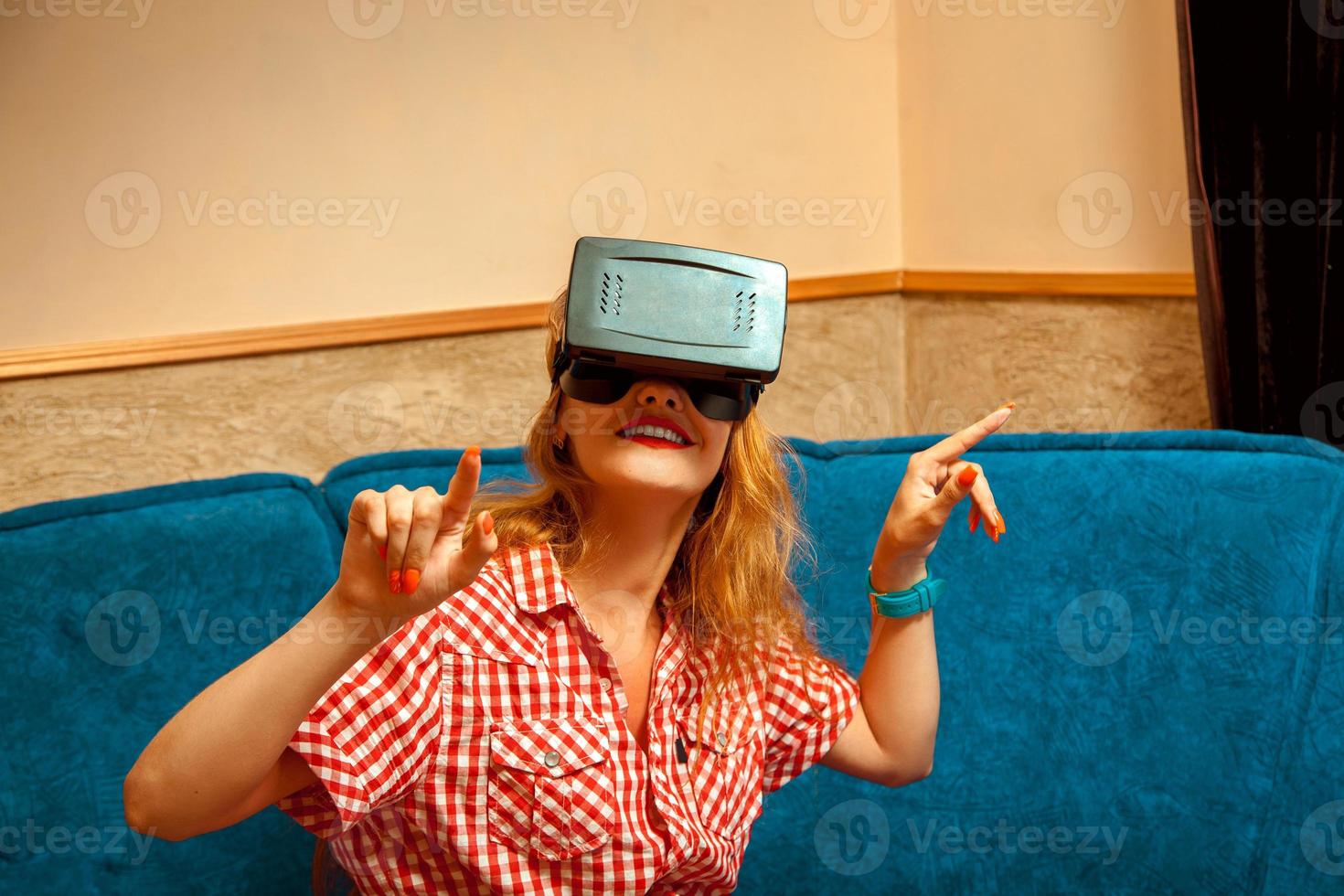young girl in virtual reality helmet photo