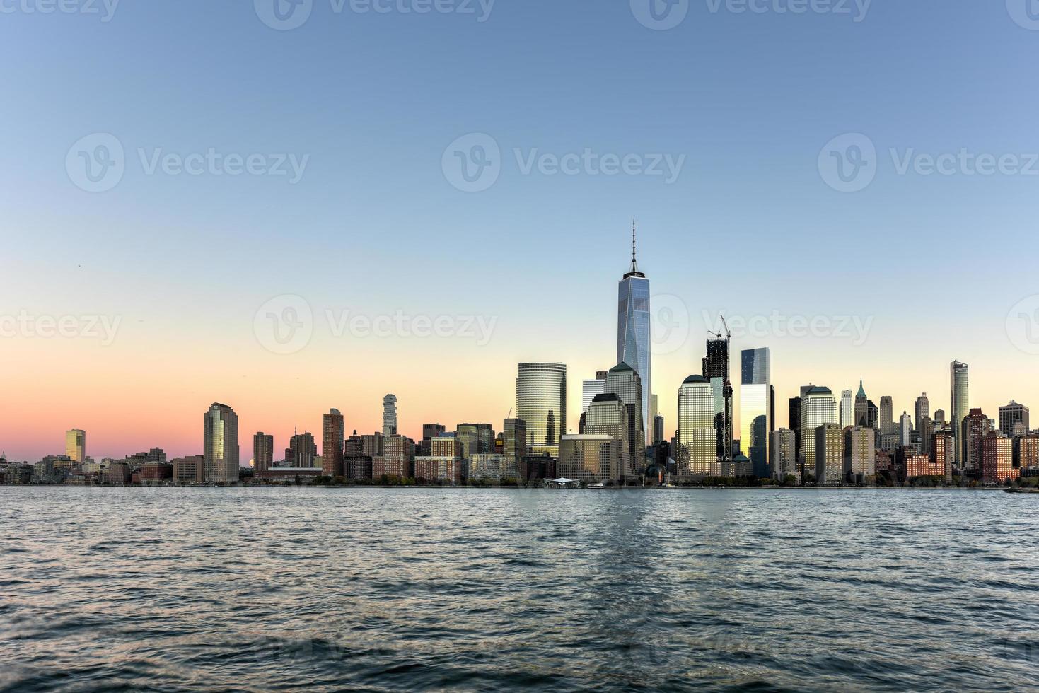 New York skyline as viewed across the Hudson River in New Jersey at sunset. photo