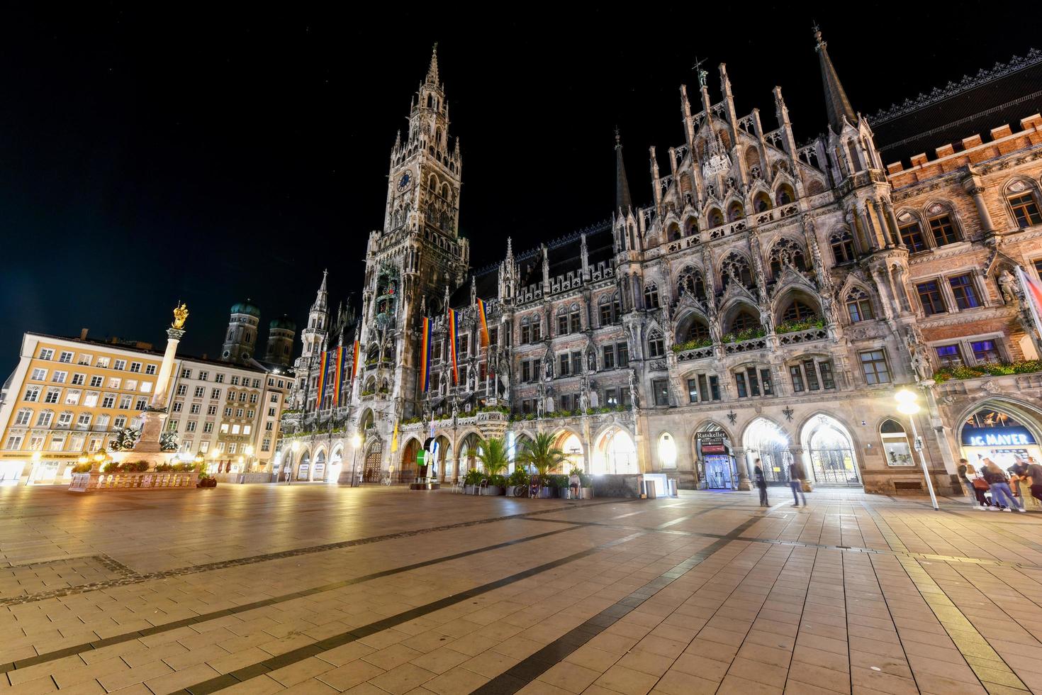 Munich, Germany - July 9, 2021 -  Night panorama of Marienplatz and Munich city hall in Munich, Germany photo