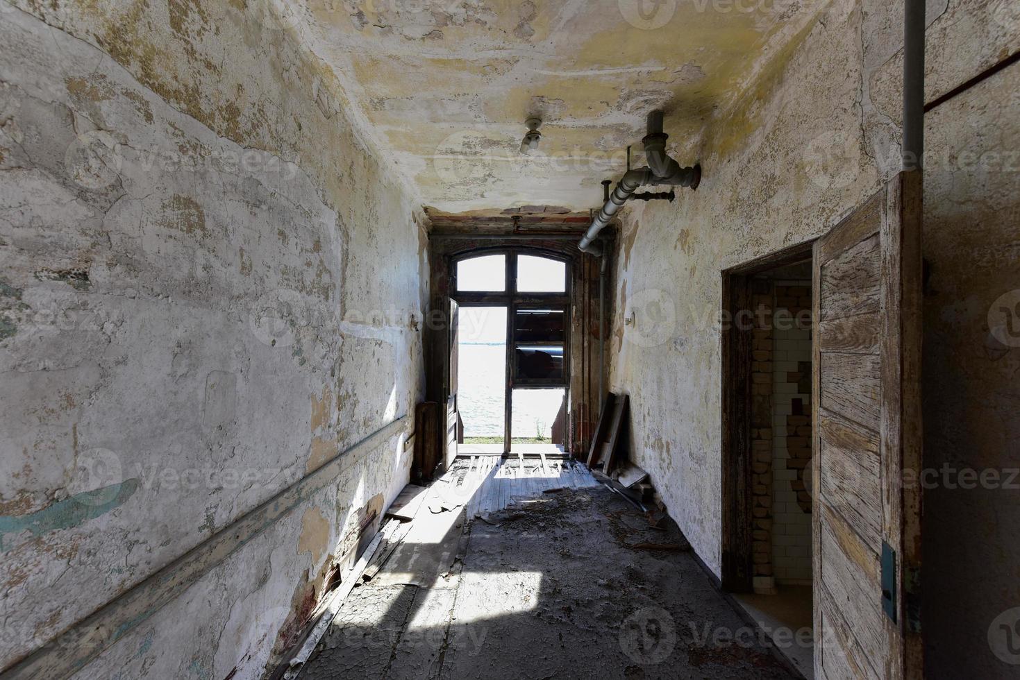 The abandoned Ellis Island Immigrant Hospital. It was the United States first public health hospital, opened in 1902 and operating as a hospital until 1930. photo
