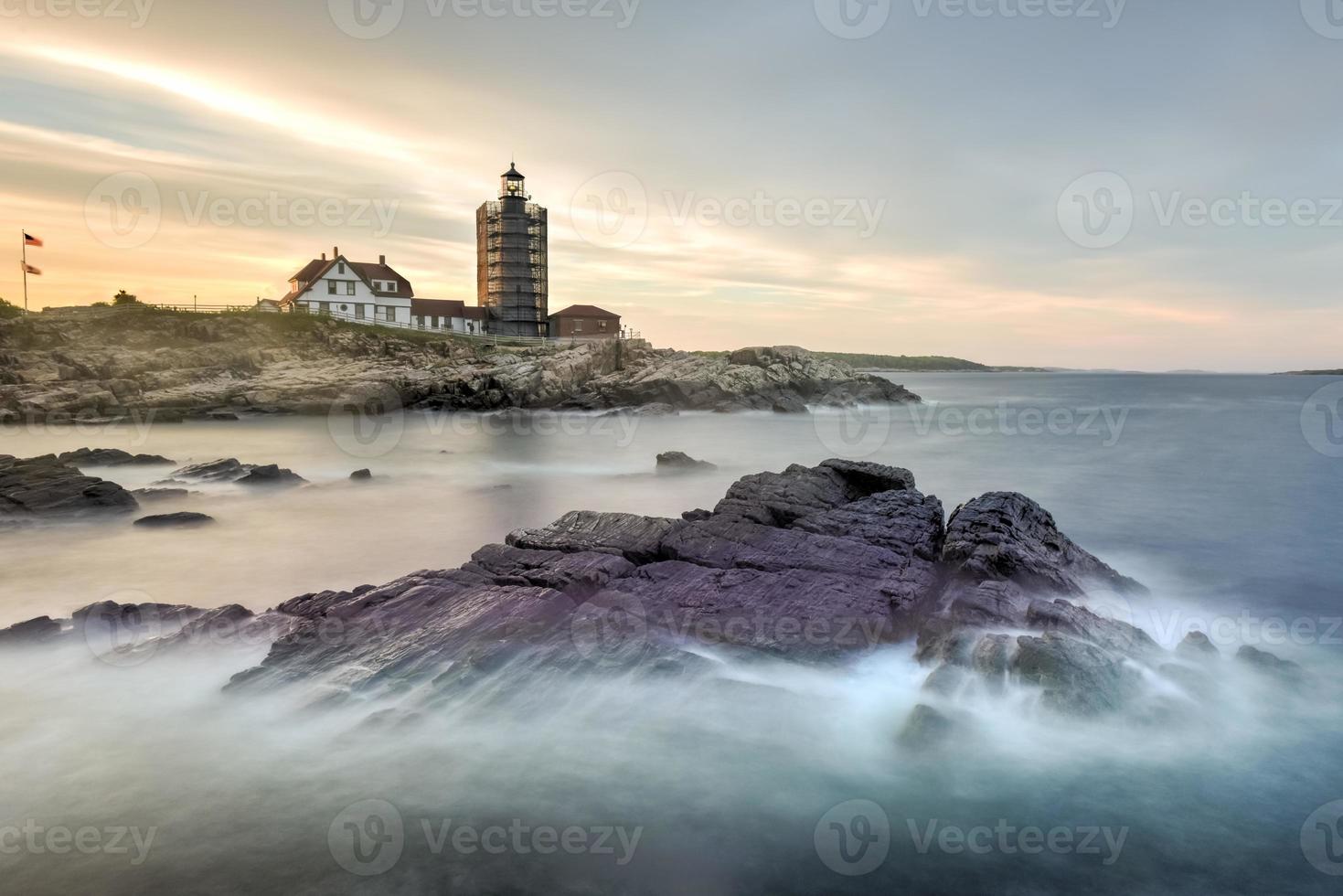 Portland Head Lighthouse in Cape Elizabeth, Maine. It is a historic lighthouse in Cape Elizabeth, Maine. Completed in 1791, it is the oldest lighthouse in the state of Maine. photo