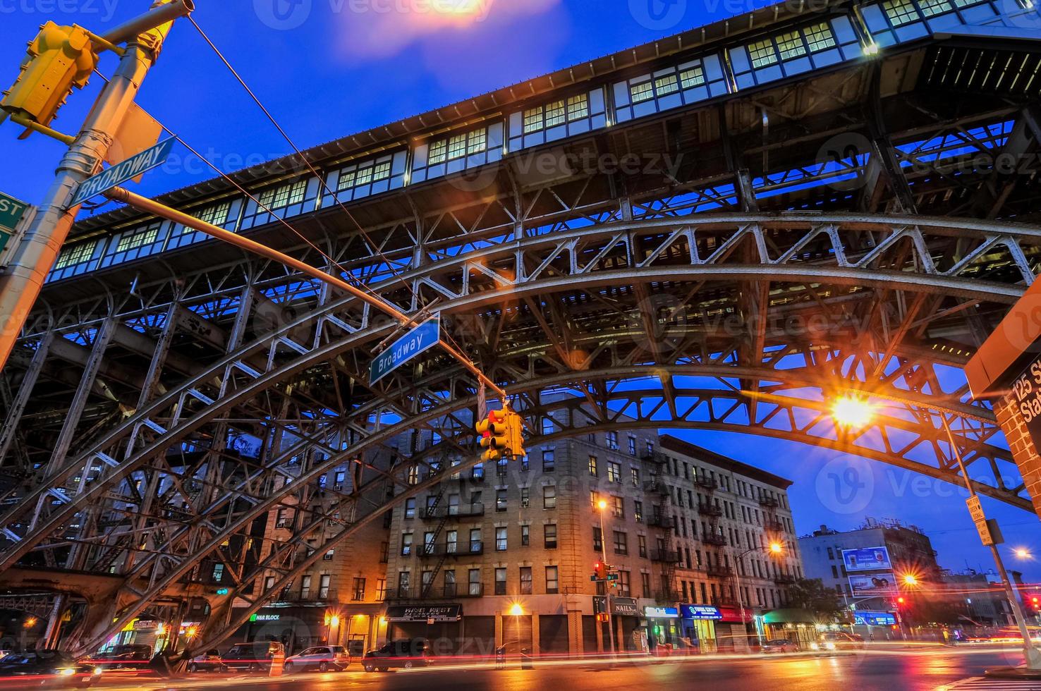 Elevated train tracks at the 125th Street Subway Station and Broadway in New York City. photo