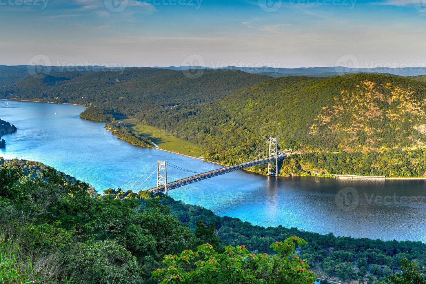 The Bear Mountain Bridge, ceremoniallynamed the Purple Heart Veterans Memorial Bridge, is a toll suspension bridge in New York State. photo