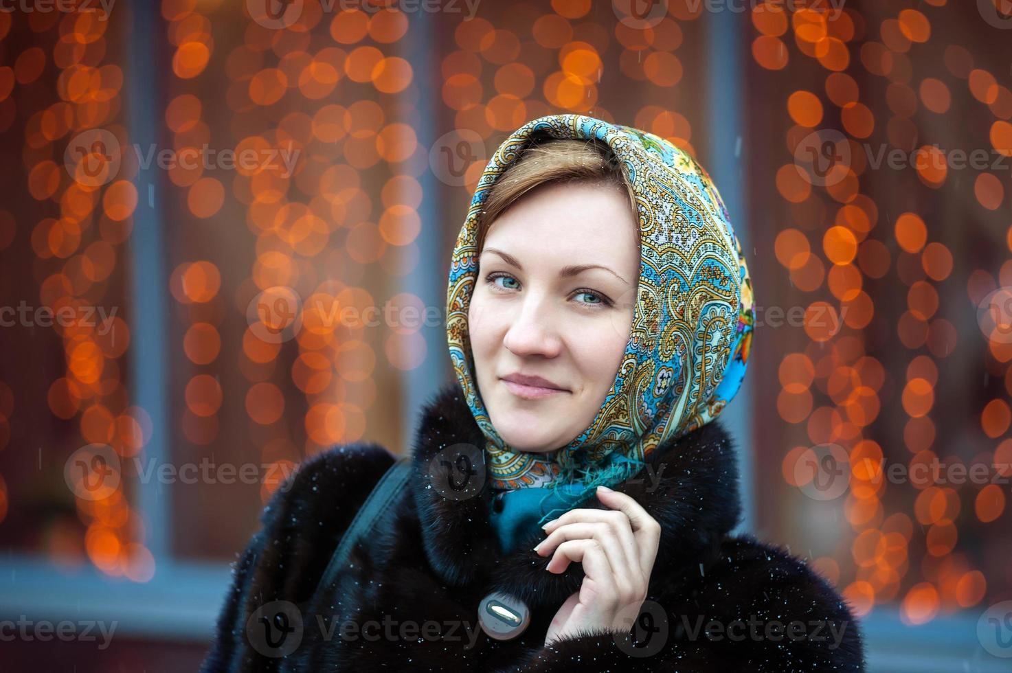 Street portrait of a girl in a coat photo