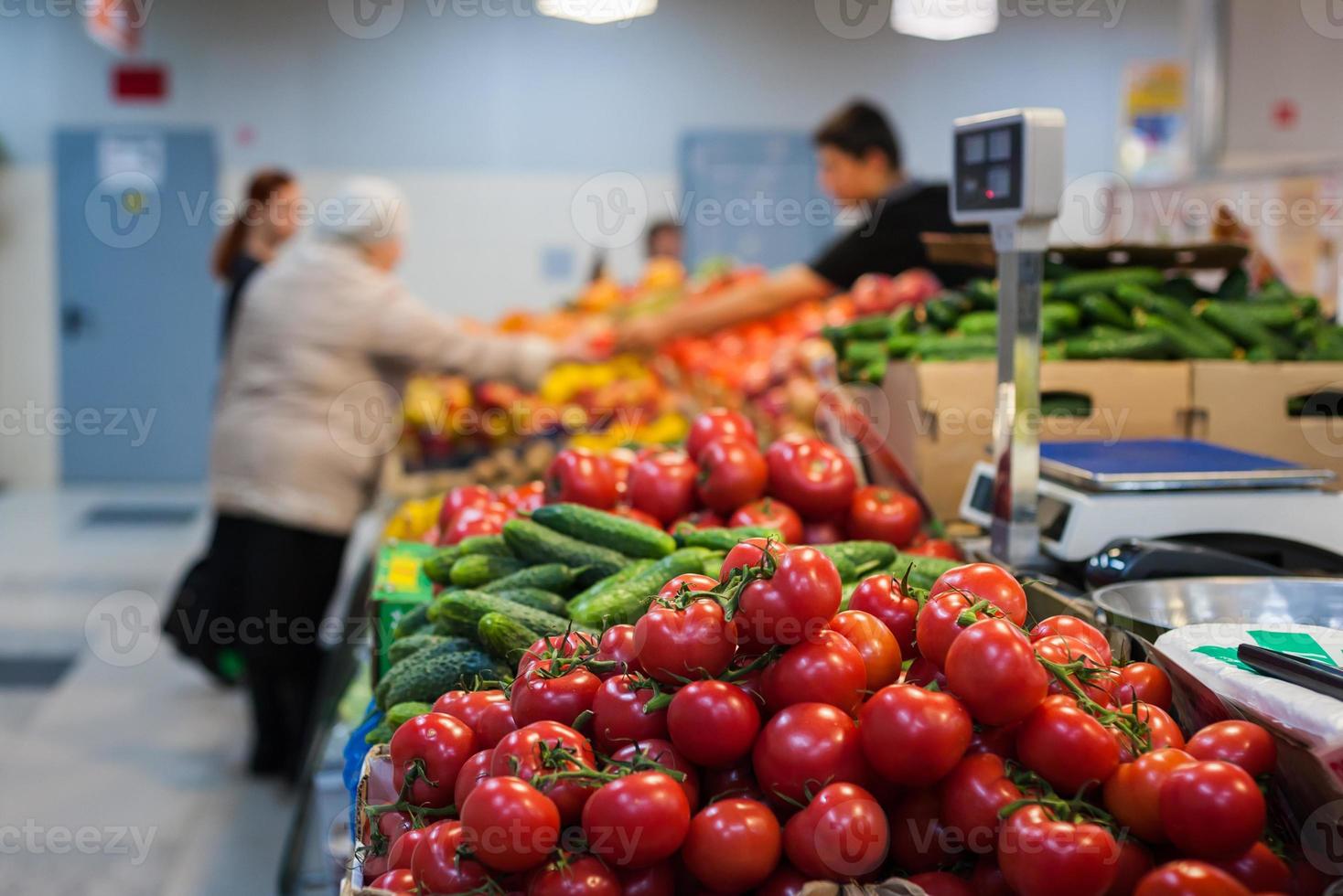 Fruit market with various colorful fresh fruits and vegetables photo