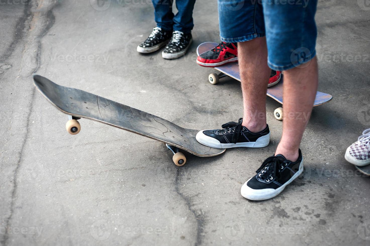 skateboarder does the trick with a jump on the ramp. Skateboarder flying in the air photo
