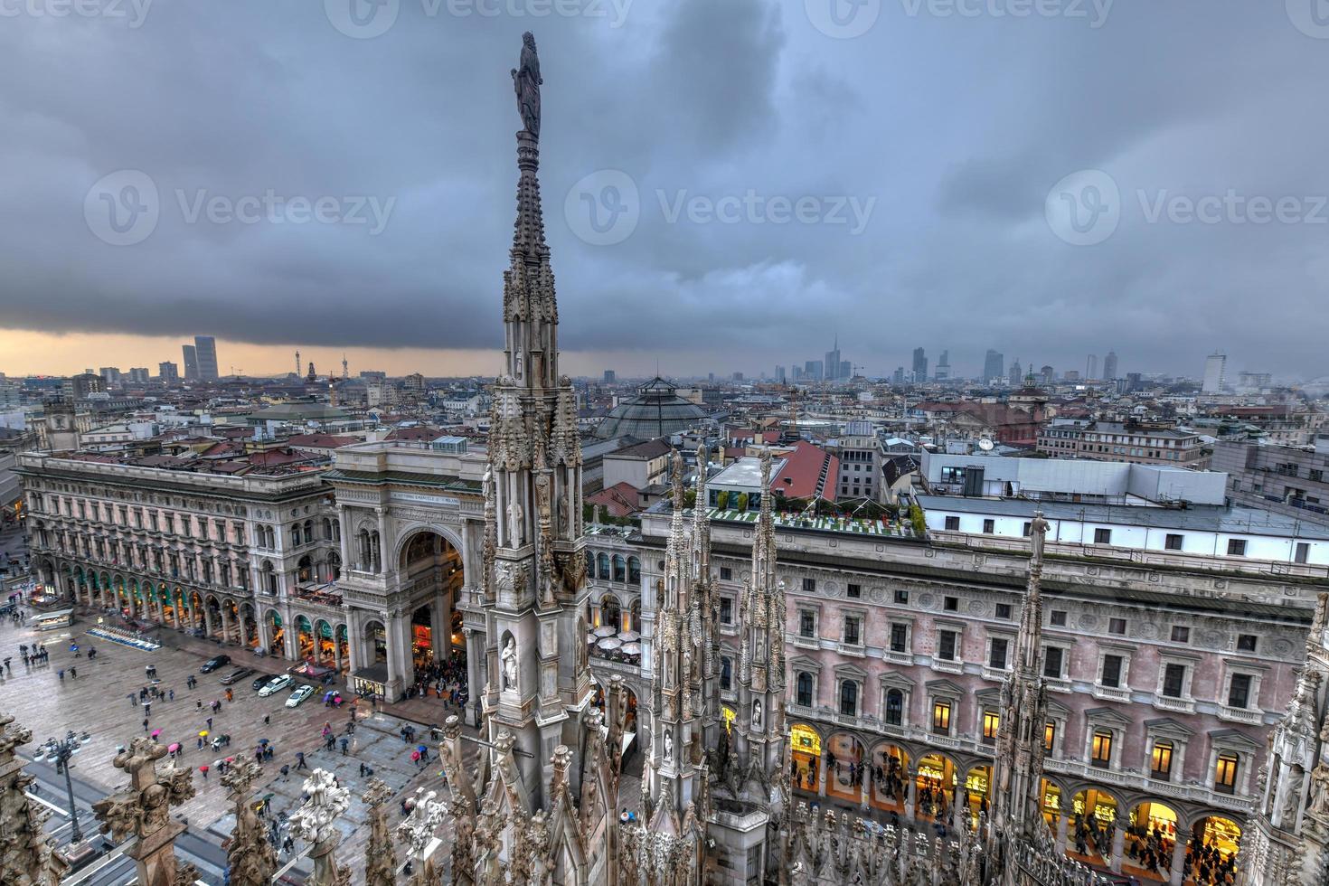 Milan Cathedral, Duomo di Milano, one of the largest churches in the world, on Piazza Duomo square in the Milan city center in Italy. photo