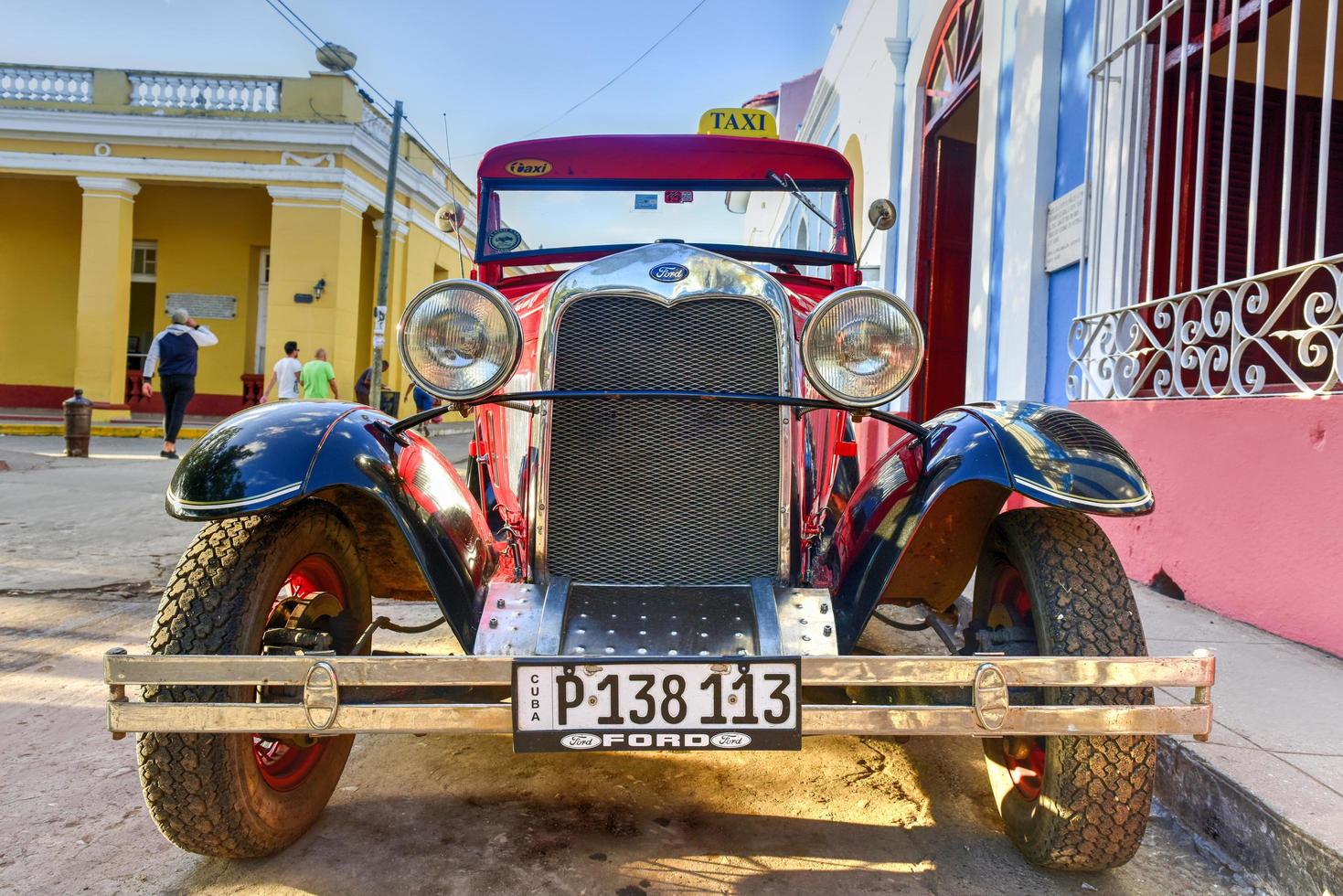 Trinidad, Cuba - January 12, 2017 -  Classic Ford in the old part of the streets of Trinidad, Cuba. photo