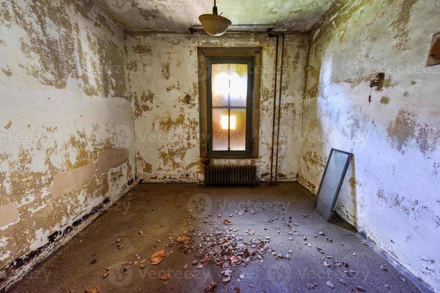 The abandoned Ellis Island Immigrant Hospital. It was the United States first public health hospital, opened in 1902 and operating as a hospital until 1930. photo