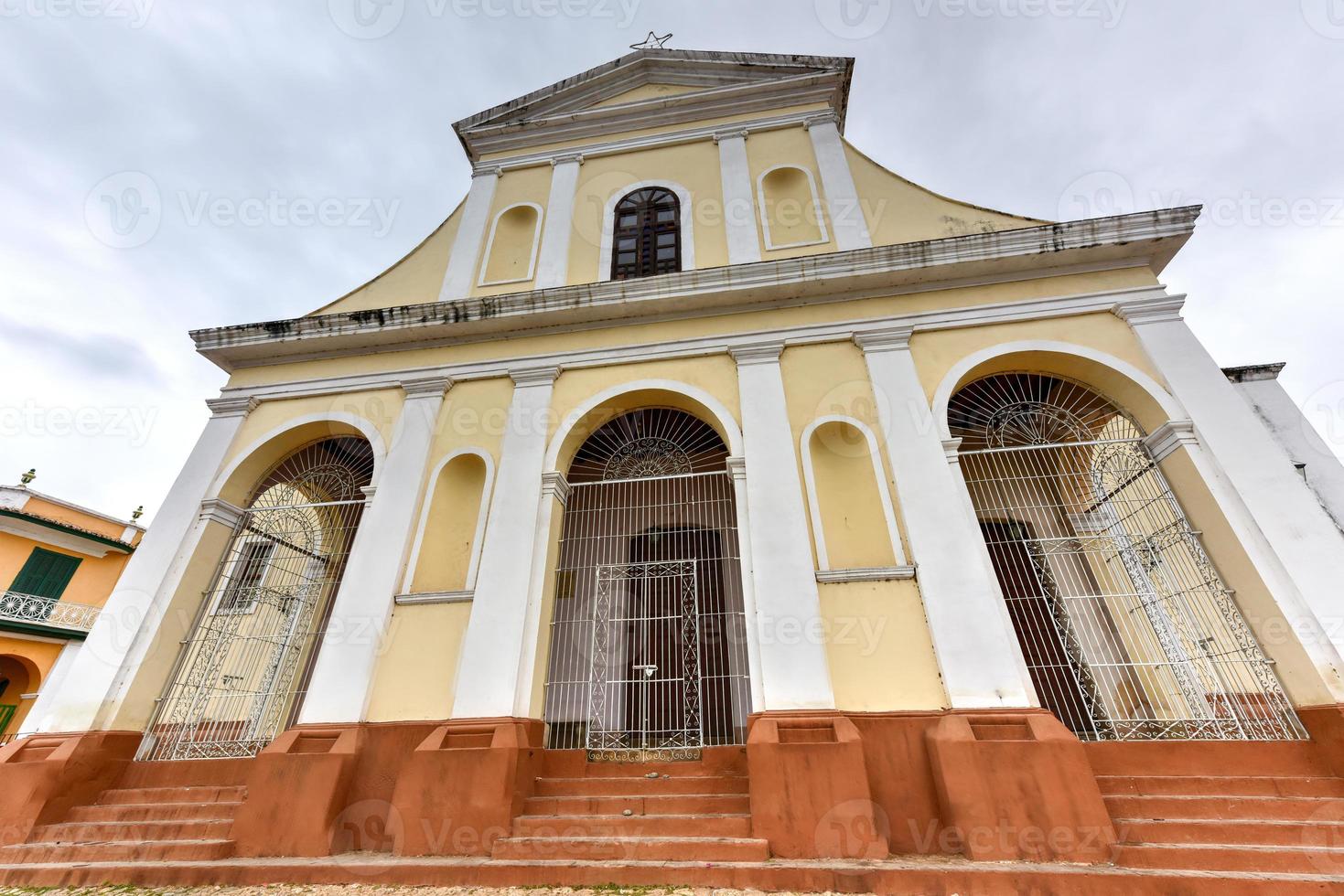 Holy Trinity Church in Trinidad, Cuba. The church has a Neoclassical facade and is visited by thousands of tourists every year. photo