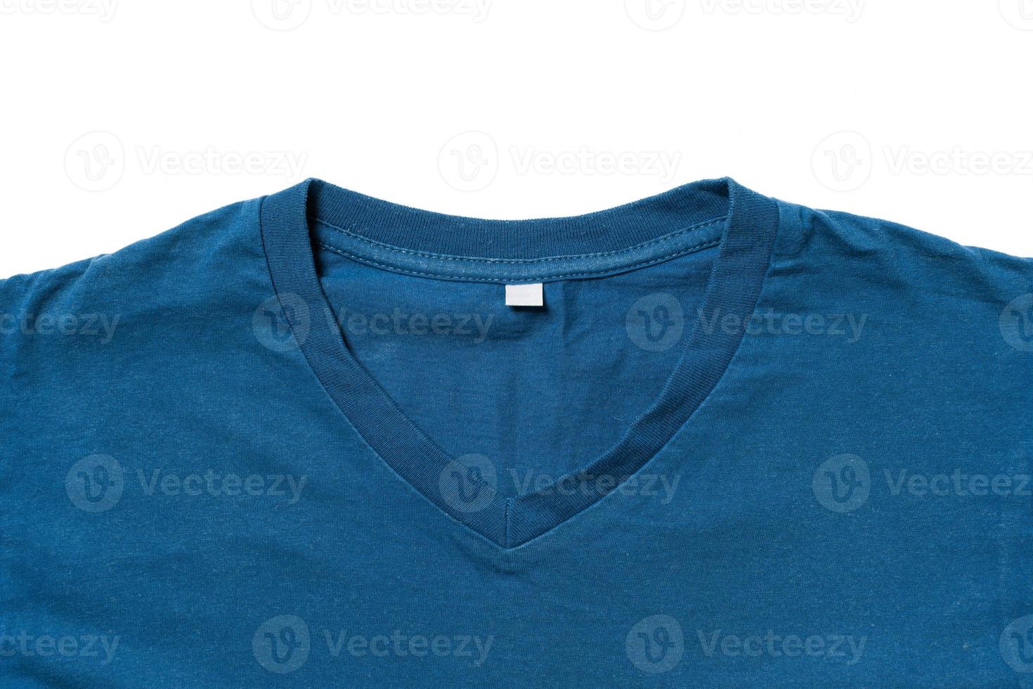 Worn old blue t shirt on white background photo