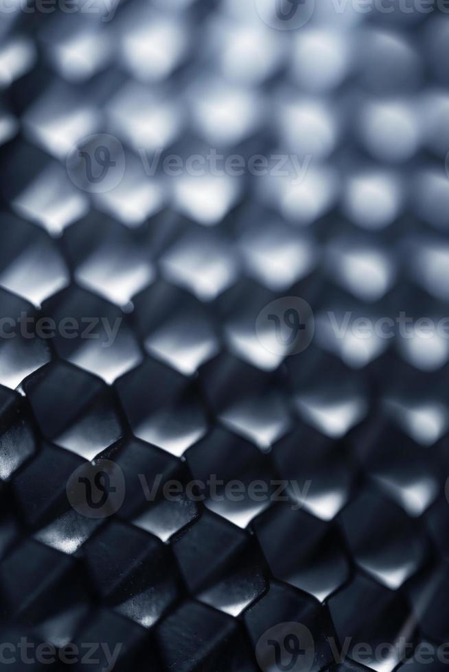 Abstract hi-tech surface with a honeycomb cells photo