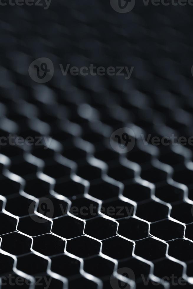 Abstract hi-tech surface with a honeycomb cells photo