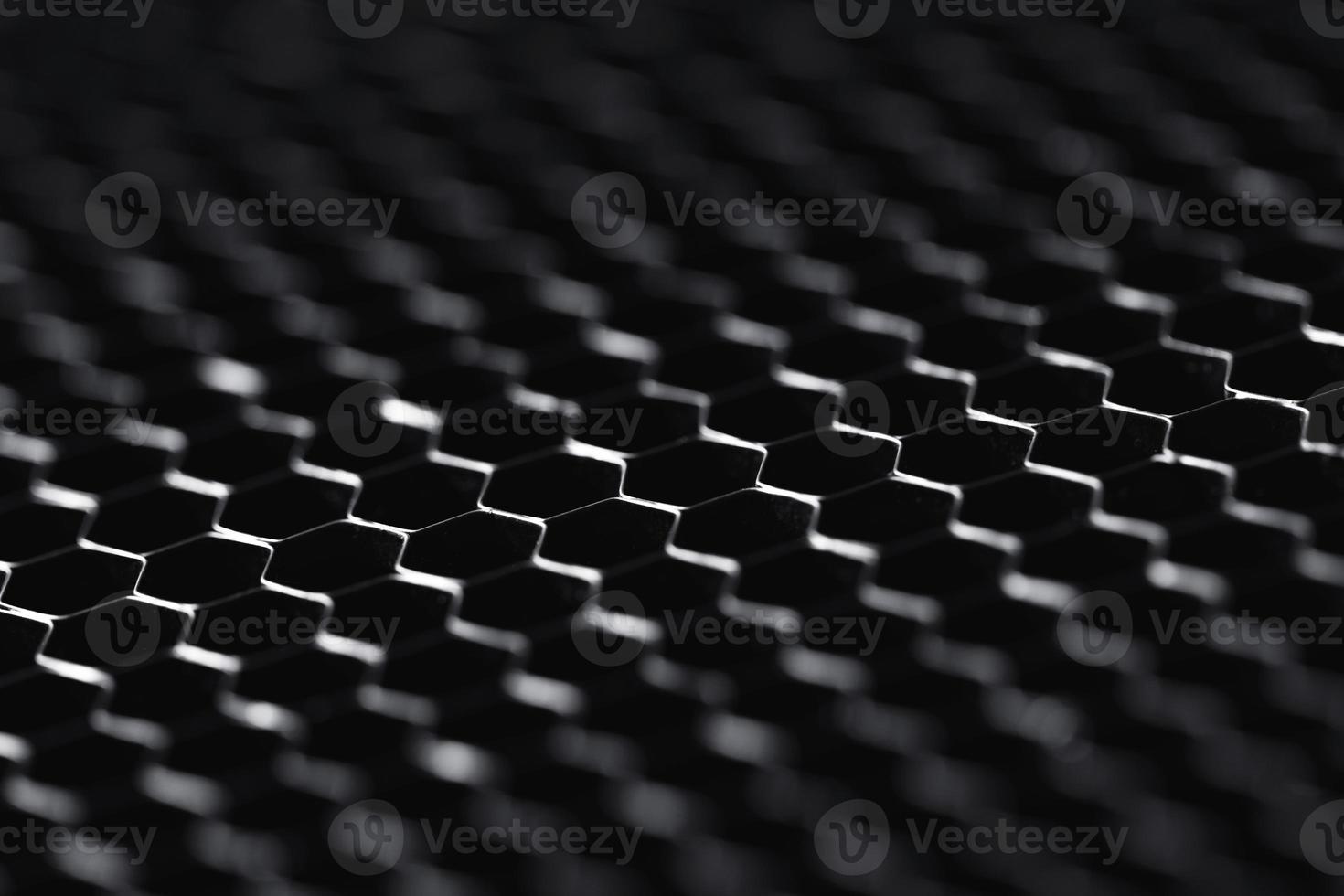 Abstract hi-tech surface with a honeycomb cells photo