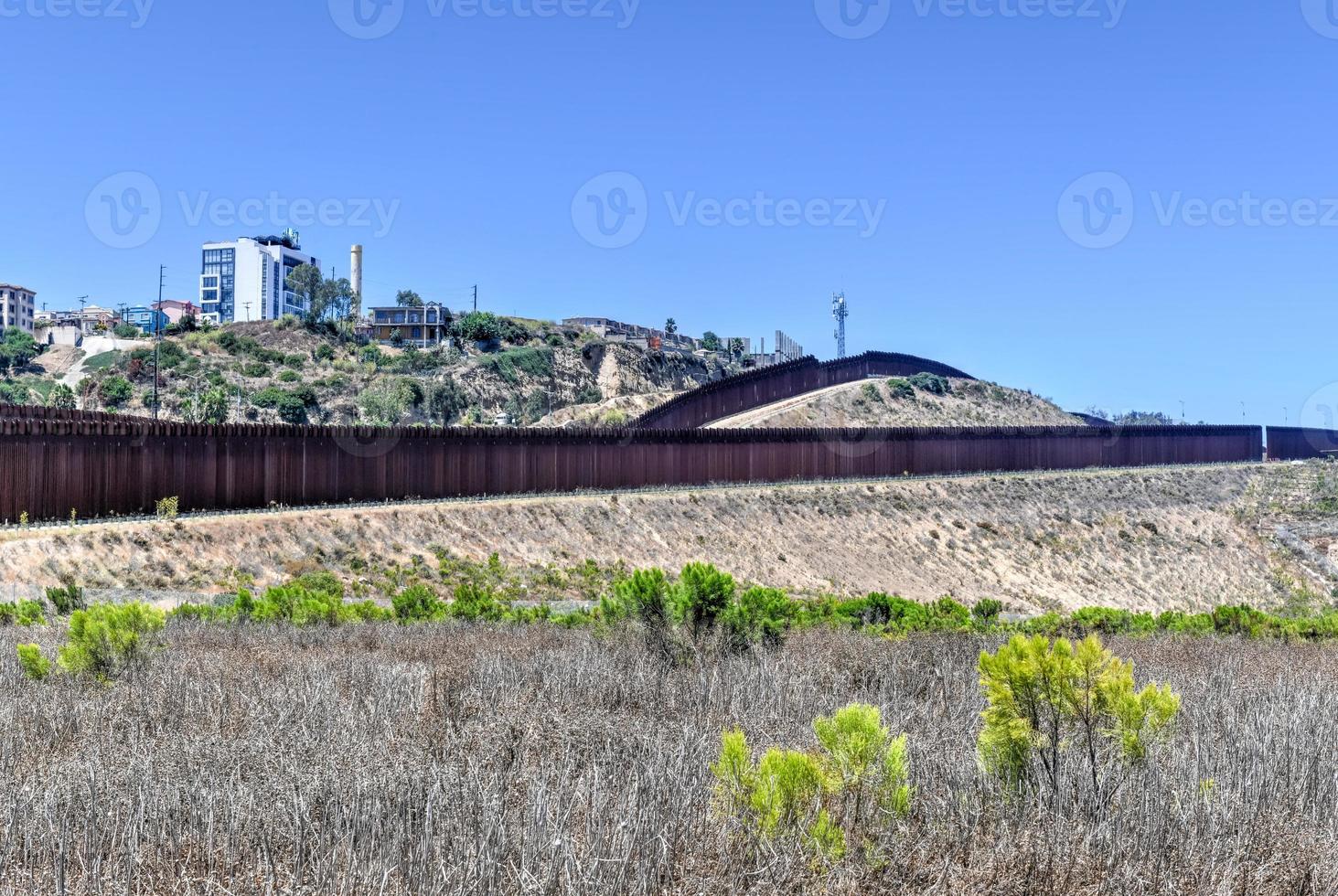 The Border Wall between the United States and Mexico from San Diego, California looking towards Tijuana, Mexico. photo