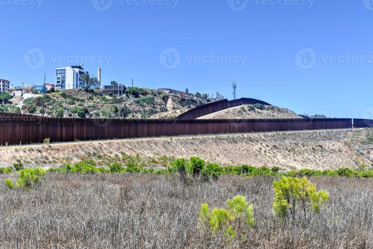 The Border Wall between the United States and Mexico from San Diego, California looking towards Tijuana, Mexico. photo