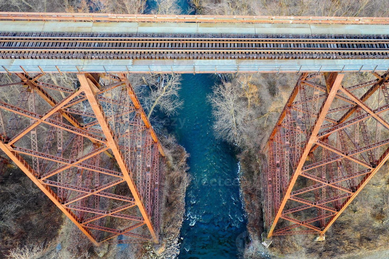 Moodna Viaduct Trestle. The Moodna Viaduct is an iron railroad trestle spanning Moodna Creek and its valley at the north end of Schunemunk Mountain in Cornwall, New York. photo