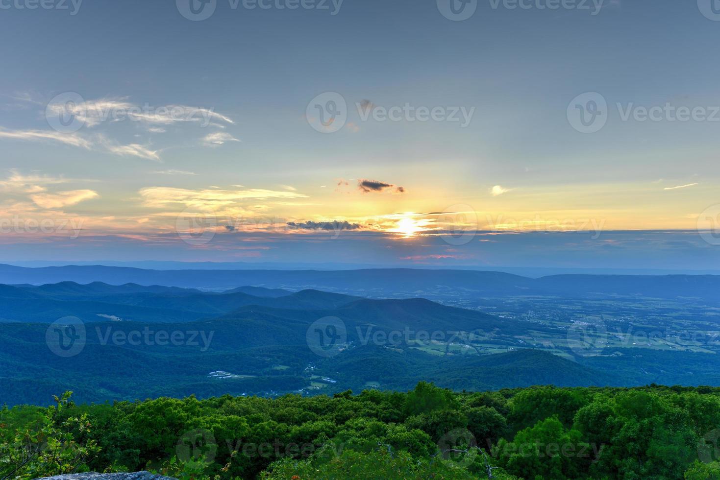 View of sunset over the Shenandoah Valley and Blue Ridge Mountains from Shenandoah National Park, Virginia photo