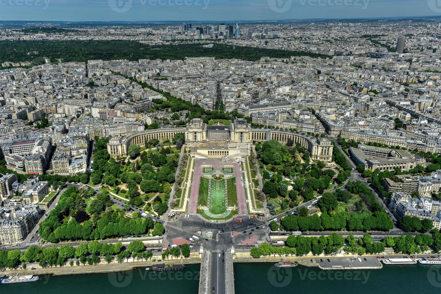 Aerial view of Trocadero as seen from the Eiffel Tower with La Defense in the background in Paris, France. photo
