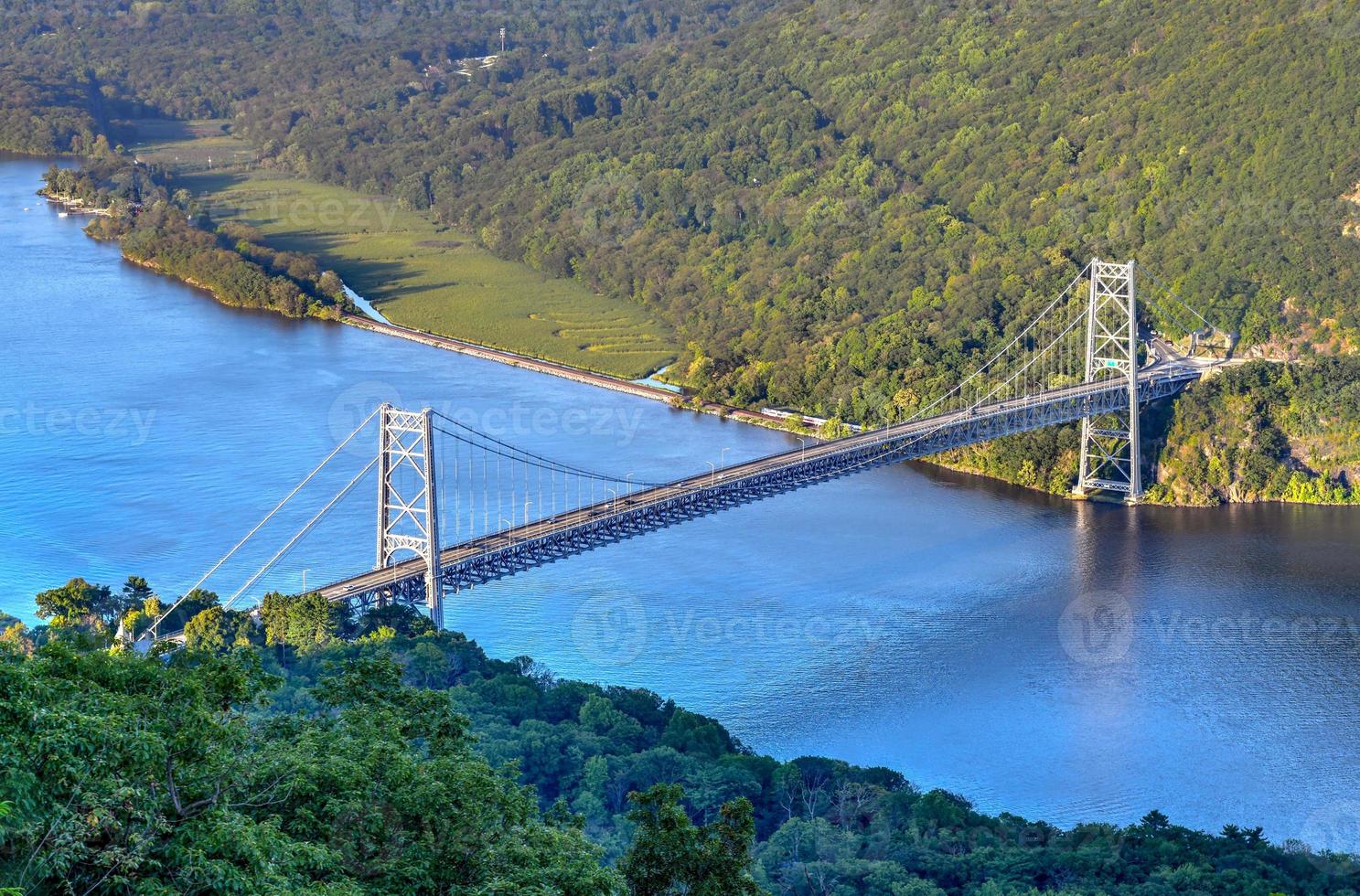 The Bear Mountain Bridge, ceremoniallynamed the Purple Heart Veterans Memorial Bridge, is a toll suspension bridge in New York State. photo