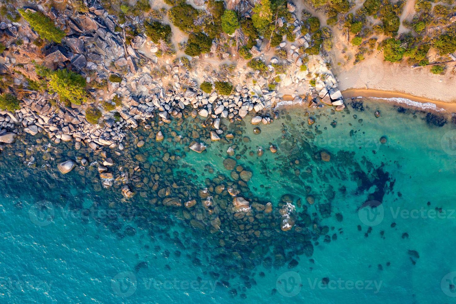 Secret Cove along Lake Tahoe in Nevada. Secret Cove is one of a series of beaches located along Highway 28 on the remote east shore of Lake Tahoe. photo