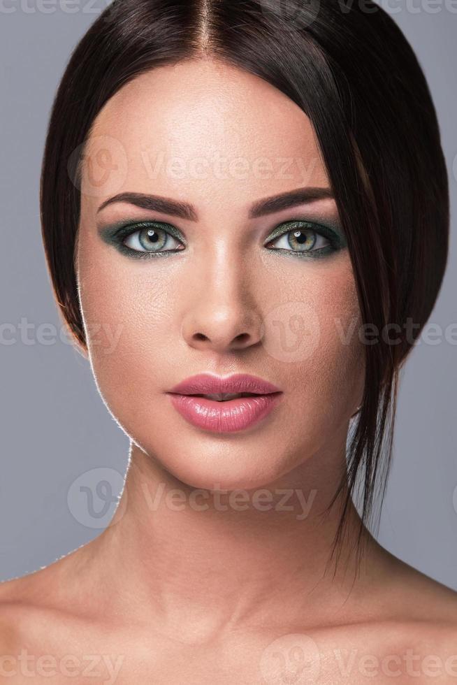 Portrait of gorgeous woman with beautiful makeup photo