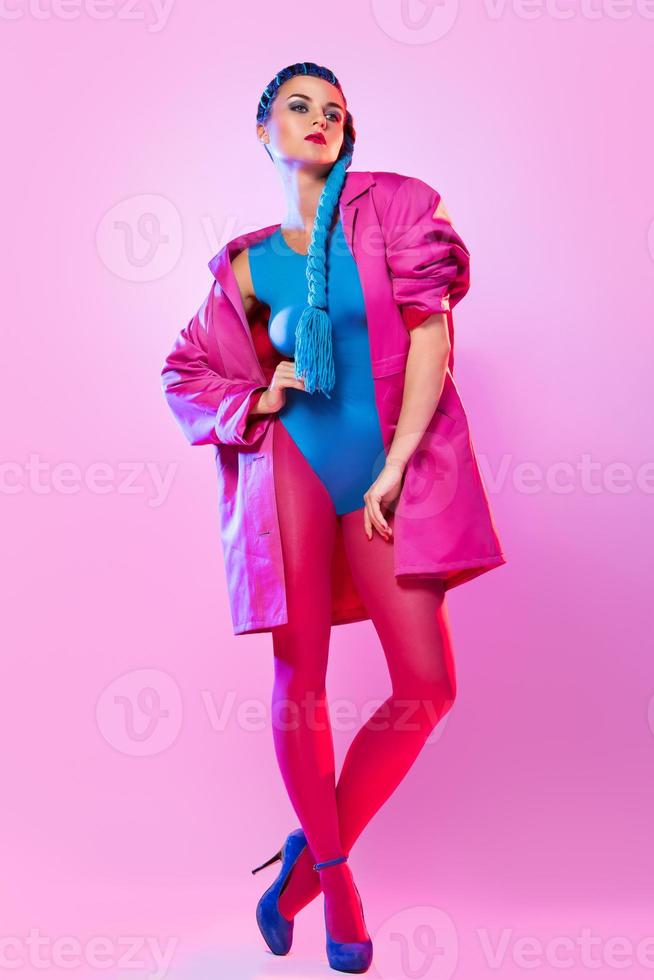 Stylish woman in pink and blue clothes photo