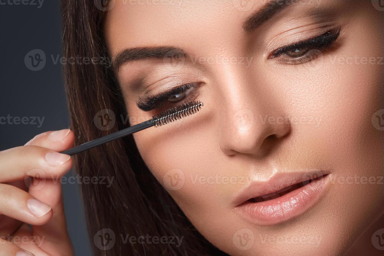 Woman with eyelash extension for maximum volume photo
