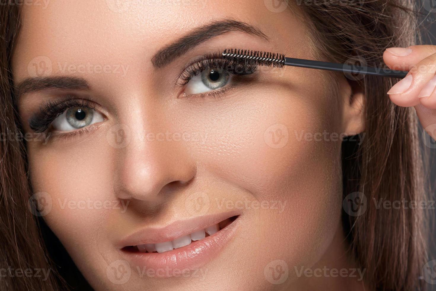 Woman with eyelash extension for maximum volume photo