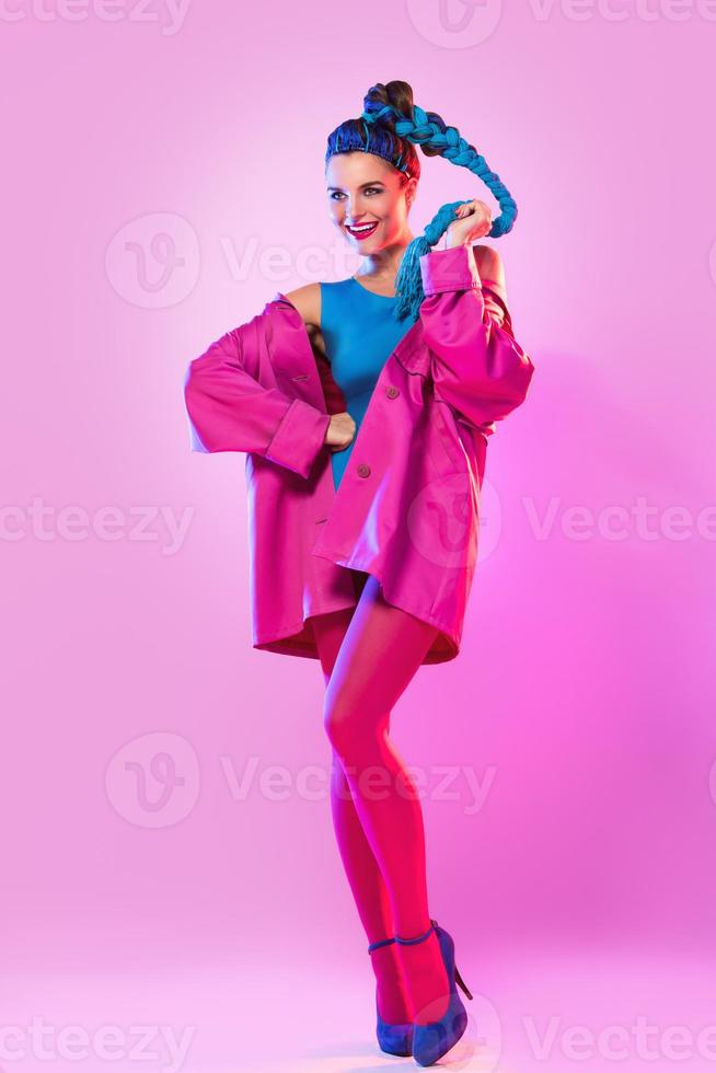 Stylish woman in pink and blue clothes photo