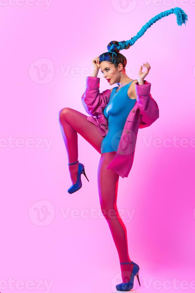 Stylish woman in pink and blue clothes photo