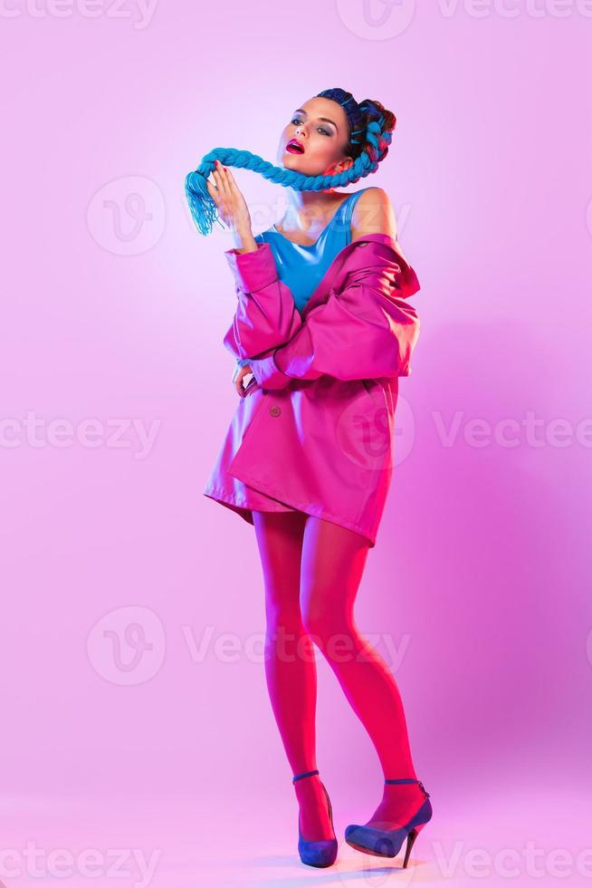 Stylish woman in pink and blue clothes photo