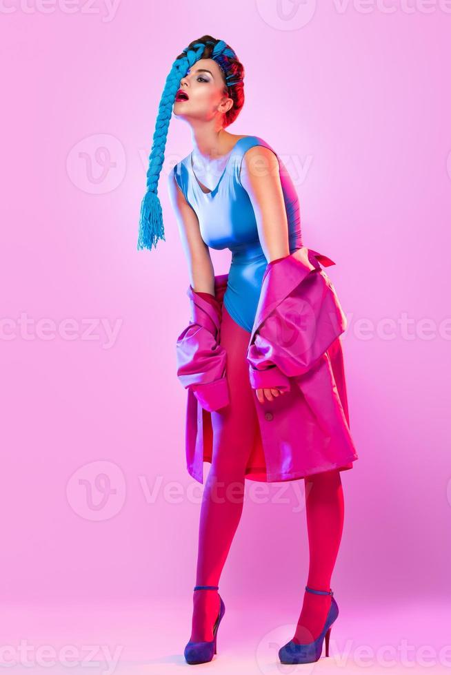 Stylish woman in pink and blue clothes photo