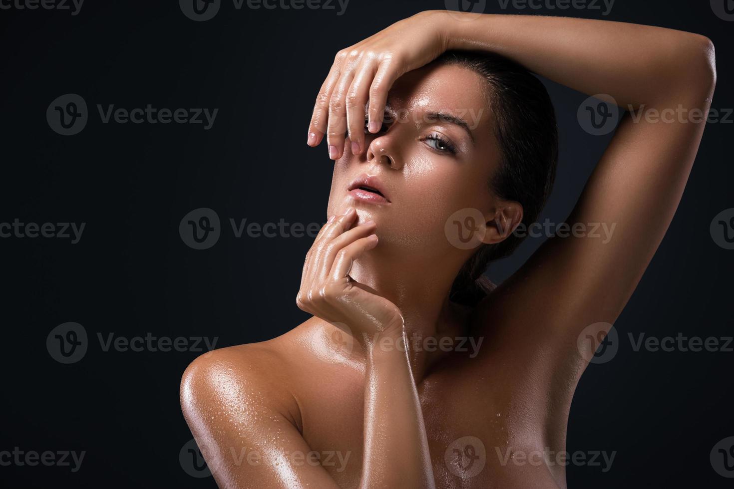 Beautiful woman with oily and wet skin photo