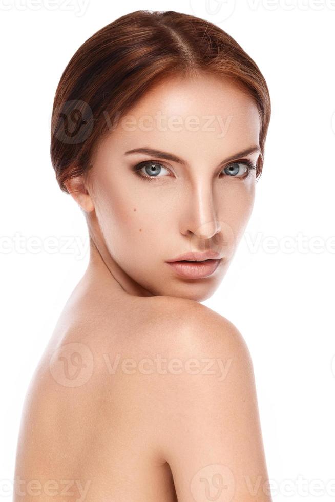 Woman with perfect face on white background photo